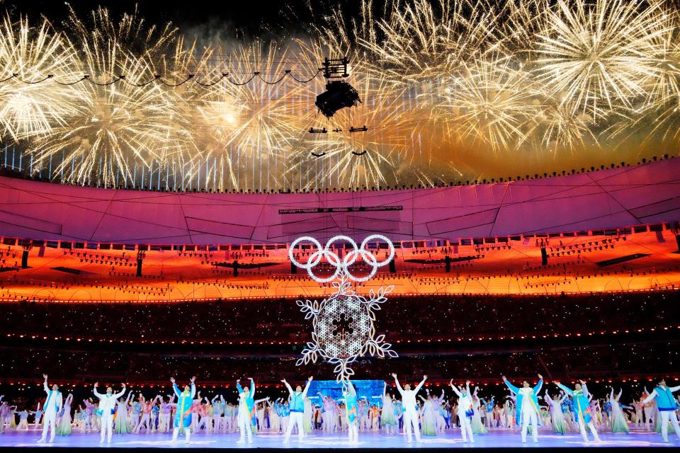 A fireworks display at Beijing National Stadium on Sunday helps close out the Winter Games, where only 437 people tested positive for the coronavirus out of 1.8 million tests administered.