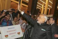 India's Prime Minister Narendra Modi waves to well wishers after arriving at his hotel ahead of the 2015 General Assembly of the United Nations in Manhattan, New York September 23, 2015. REUTERS/Mohammed Jaffer