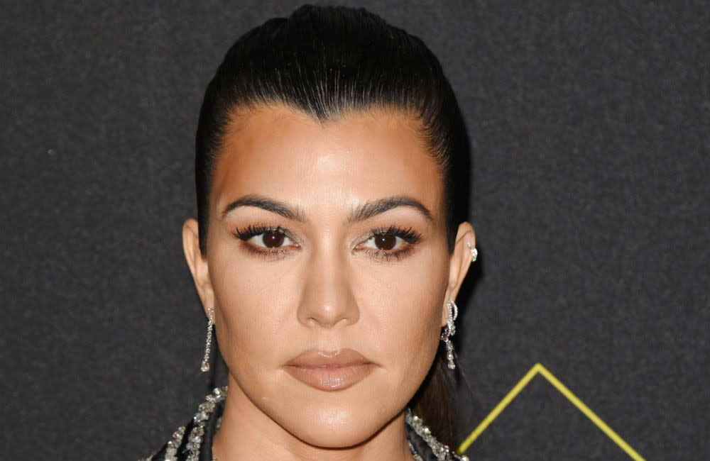 Kourtney Kardashian hits back at critic credit:Bang Showbiz