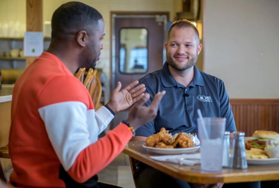 Busy Corner owner Derek Vollmer, right, chats with J Russell, host of "America's Best Restaurants," during taping of an episode at the popular restaurant Wednesday, March 13, 2024 in Goodfield.
(Credit: MATT DAYHOFF/JOURNAL STAR)