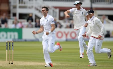 Cricket - England v New Zealand - Investec Test Series First Test - Lord's - 25/5/15 England's James Anderson, Stuart Broad and Joe Root celebrate after the dismissal of New Zealand's Martin Guptill Action Images via Reuters / Philip Brown Livepic