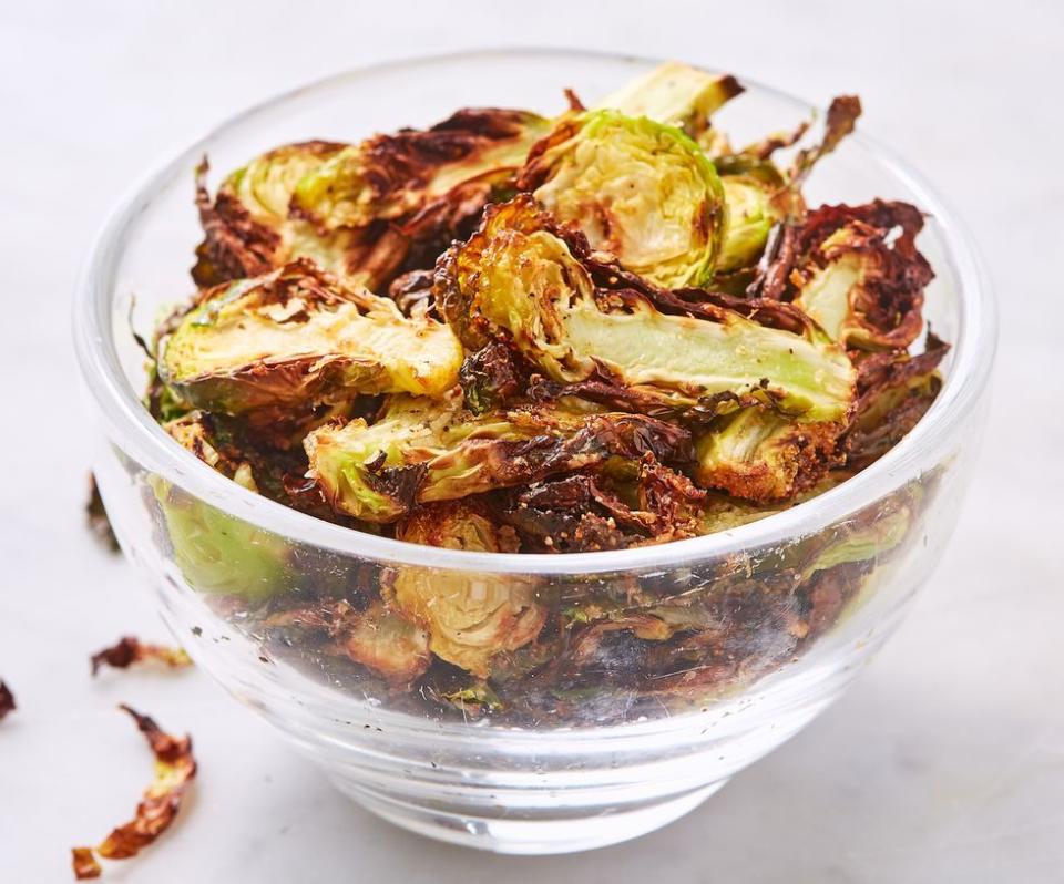 <p>An air fryer can turn a very healthy vegetable into a crunchy treat everyone will love.</p><p><a href="https://www.delish.com/cooking/recipe-ideas/a19673558/best-brussels-sprout-chips-recipe/" rel="nofollow noopener" target="_blank" data-ylk="slk:Get the recipe from Delish »;elm:context_link;itc:0;sec:content-canvas" class="link "><em>Get the recipe from Delish »</em></a></p>