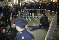 Members of the Occupy Wall St movement are arrested by NYPD officers after protesting at Zuccotti park in New York March 17, 2012.