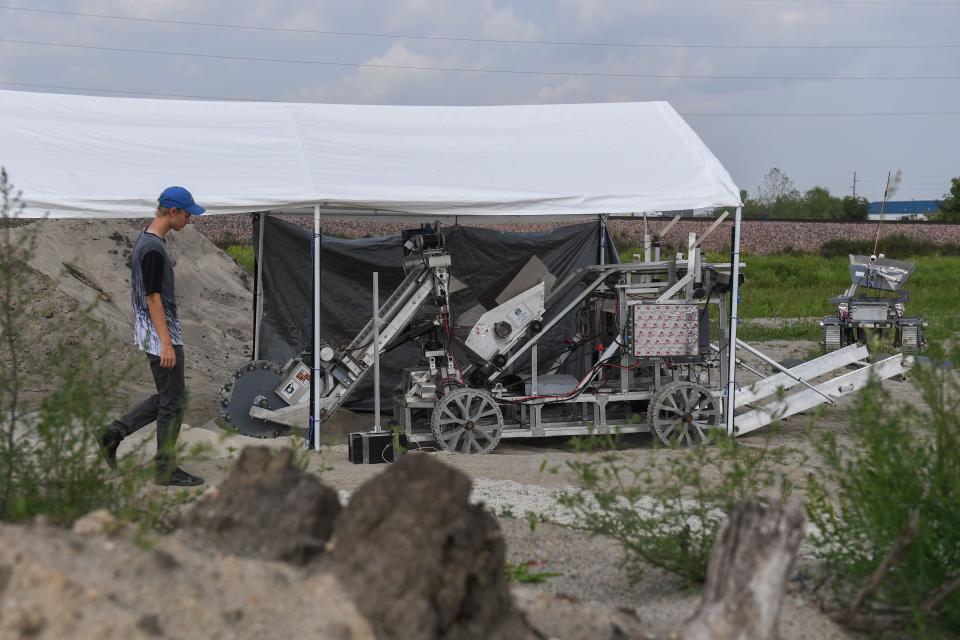 The Space Trajectory team's excavator drills away at an 8-by-150 foot soft concrete patch resembling icy moon dirt, or regolith, found in the coldest and darkest places on the moon’s surface. The excavator as pictured at the Brookings testing site on Wednesday, Aug. 9, 2023.