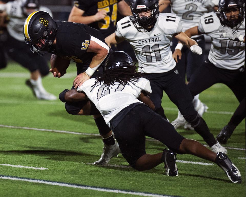 Westerville Central's Mario Williams makes a tackle against Upper Arlington last season.