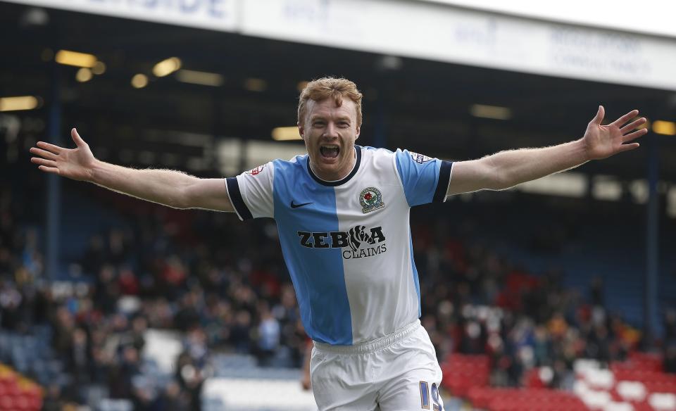 Blackburn Rovers' Chris Taylor celebrates after scoring a goal during their FA Cup fourth round soccer match against Swansea City at Ewood Park in Blackburn, northern England January 24, 2015. REUTERS/Andrew Yates (BRITAIN - Tags: SPORT SOCCER)