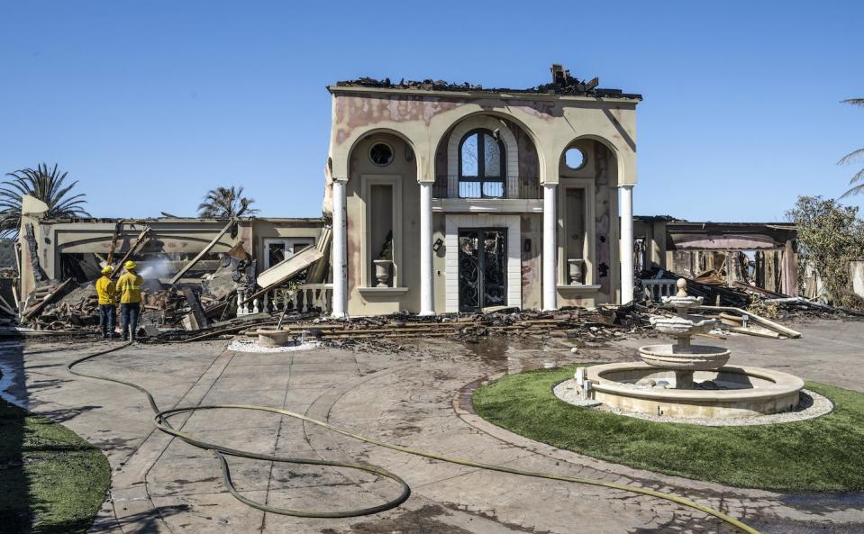 Expensive home building prices in California have also raised the risk for insurers. <a href="https://www.gettyimages.com/detail/news-photo/firefighters-puts-out-hot-spots-at-a-house-on-vista-court-news-photo/1397094373?adppopup=true" rel="nofollow noopener" target="_blank" data-ylk="slk:Paul Bersebach/MediaNews Group/Orange County Register via Getty Images;elm:context_link;itc:0;sec:content-canvas" class="link ">Paul Bersebach/MediaNews Group/Orange County Register via Getty Images</a>