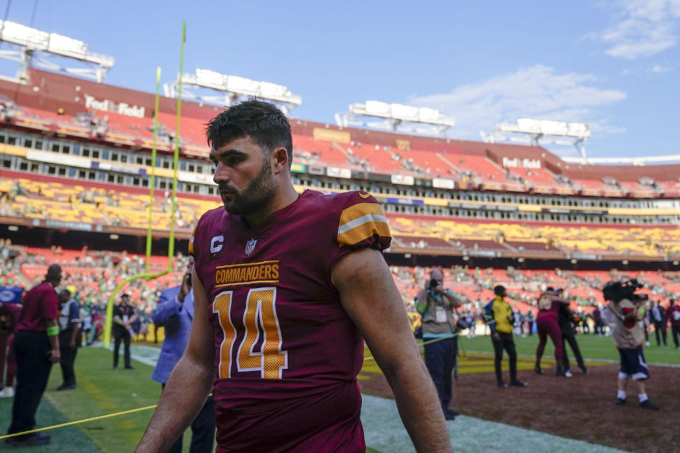 Washington Commanders quarterback Sam Howell (14) leaving the field at the end of an NFL football game against the Philadelphia Eagles, Sunday, Oct. 29, 2023, in Landover, Md. Eagles won 38-31. (AP Photo/Stephanie Scarbrough)