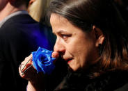 A supporter of Marine Le Pen, French National Front (FN) political party candidate for French 2017 presidential election, in tears at her campaign headquarters after her defeat in the secound round of 2017 French presidential election, Paris, France, May 7, 2017. REUTERS/Pascal Rossignol