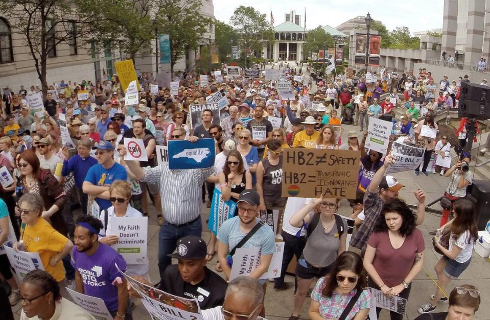 Several hundred supporters from the Moral Monday group crowd the Bicentennial Mall in support of repealing HB2 in Raleigh, N.C. Monday, April 25, 2016.