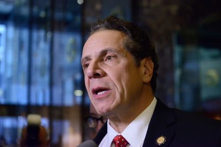 Andrew Cuomo, Governor of New York, speaks to members of the press at Trump Tower in New York City, U.S. January 18, 2017. REUTERS/Stephanie Keith