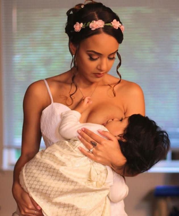 Emma's beautiful image of her breastfeeding her daughter on her wedding day has gone viral. Photo: Facebook/bfmamatalk