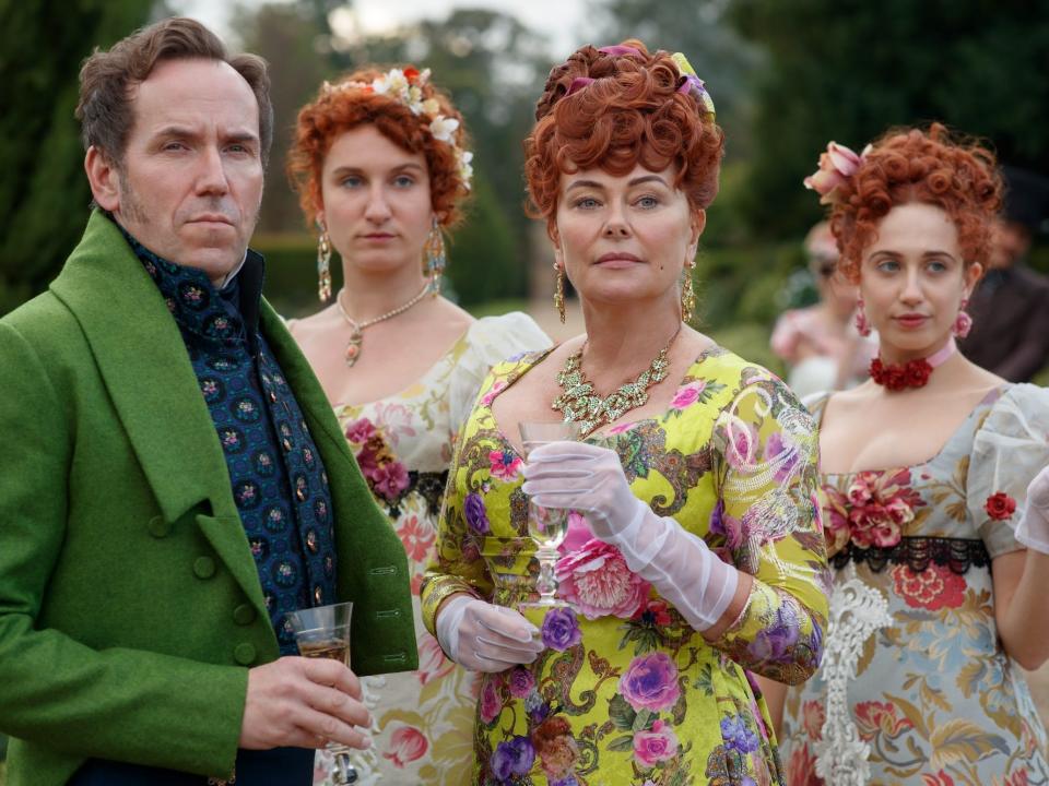 Lord Featherington (Ben Miller) and Lady Portia Feathertington (Polly Walker) with two of their daughters Prudence (Bessie Carter) and Phillipa (Harriest Cains).