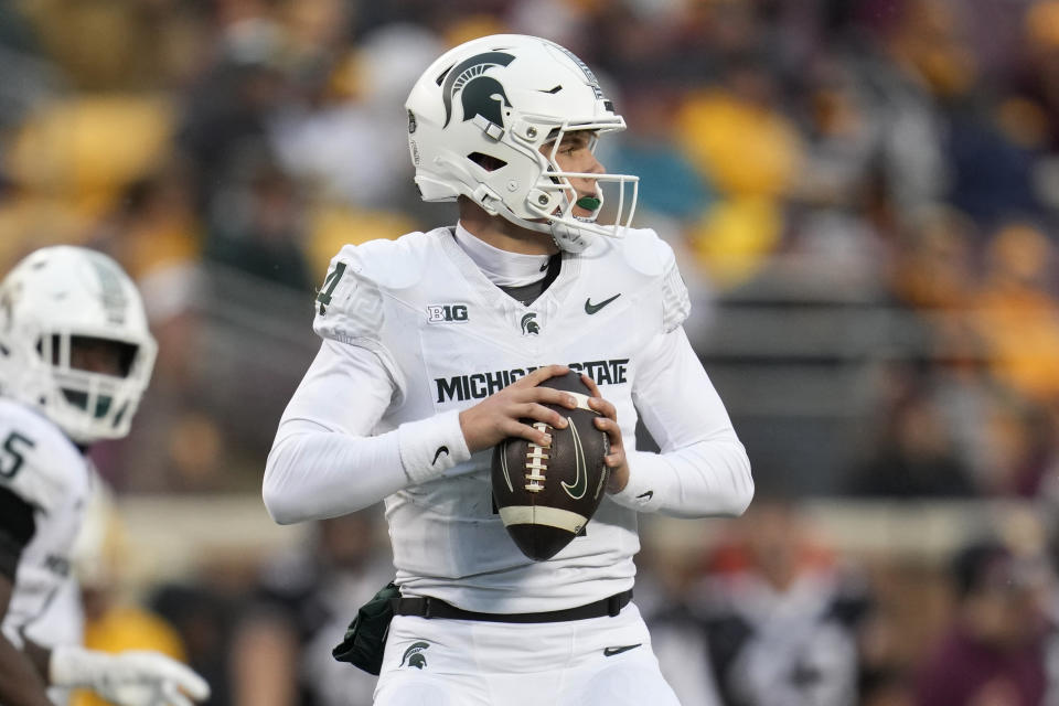 Michigan State quarterback Sam Leavitt looks to pass the ball during the second half of an NCAA college football game against Minnesota, Saturday, Oct. 28, 2023, in Minneapolis. (AP Photo/Abbie Parr)