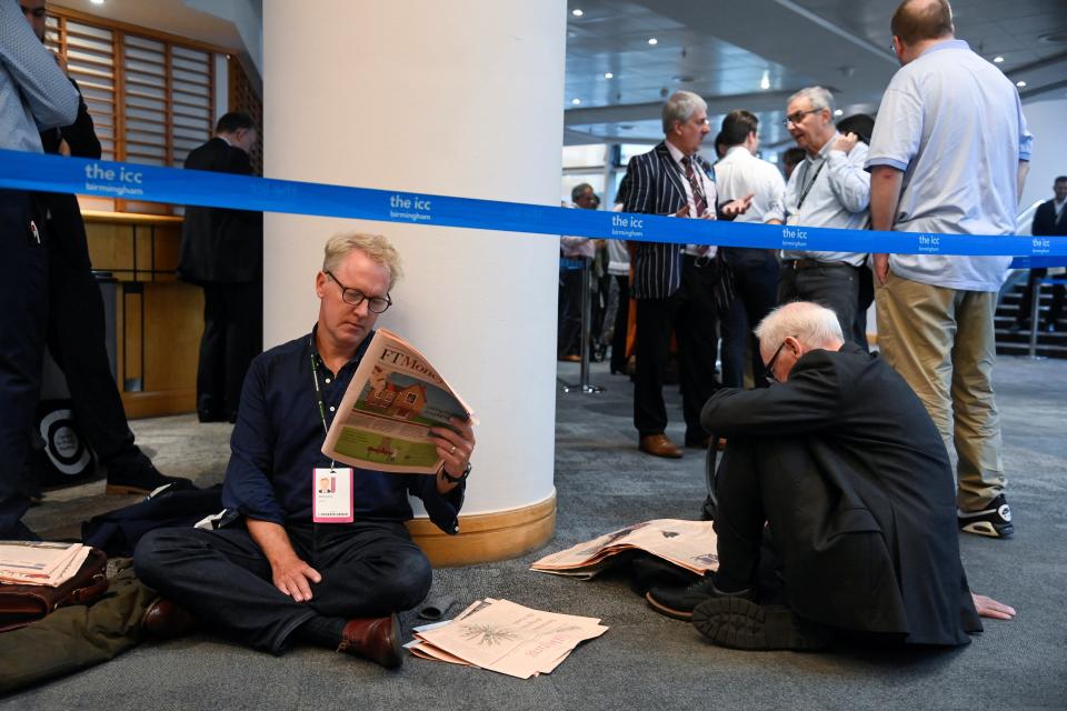 Delegates wait in queue ahead of Liz Truss speech (REUTERS)