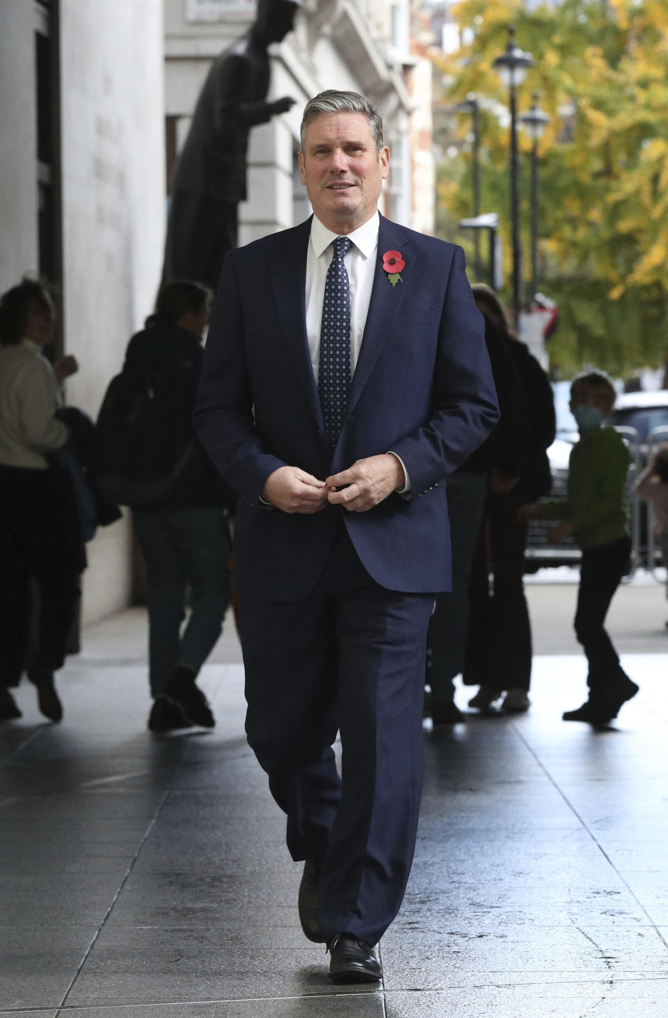 Britain's opposition Labour Party leader Keir Starmer faces the media in central London, following his appearance on a current affairs TV programme, Sunday Nov. 1, 2020. The British government announced on Saturday a four-week public lockdown in response to the coronavirus, but government lawmaker Michael Gove on Sunday acknowledged that the lockdown could be extended. (Jonathan Brady/PA via AP)