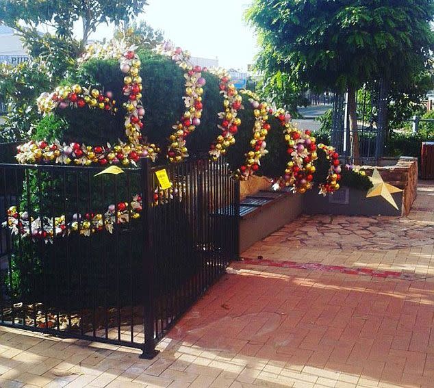 The town's Christmas tree snapped almost in half due to the teen climbing on it. Source: Supplied.