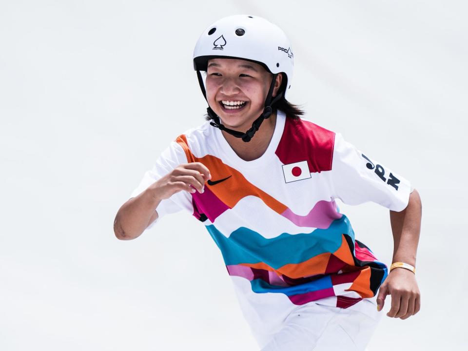 Japan's Momiji Nishiya smiles while skating at the Tokyo Olympics.