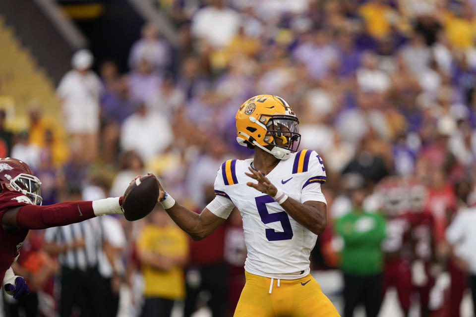 LSU quarterback Jayden Daniels (5) will have an opportunity to put up big numbers against Ole Miss this weekend. (AP Photo/Gerald Herbert)