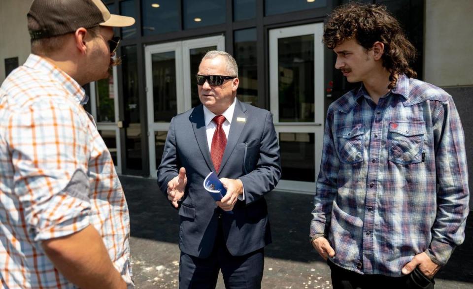 Warren Fairley, a retired Boilermakers international vice president, spoke with union members Tuesday outside the Robert J. Dole Federal Courthouse in Kansas City, Kansas.