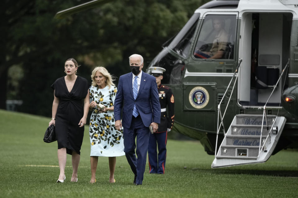 Granddaughter Naomi Biden, U.S. President Joe Biden and first lady Jill Biden exit Marine One on the South Lawn of the White House October 11, 2021 in Washington, DC. Biden and family spent the long weekend in Delaware. / Credit: Drew Angerer / Getty Images