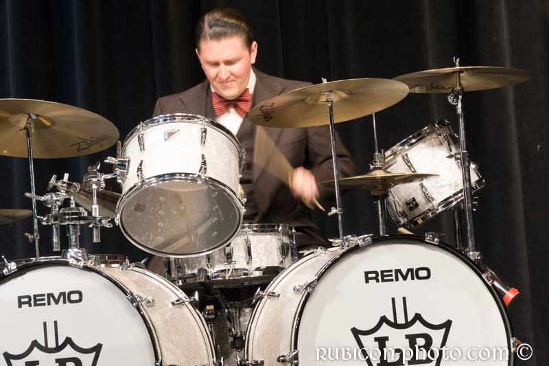 Duffee playing on the Bellson drum set.
