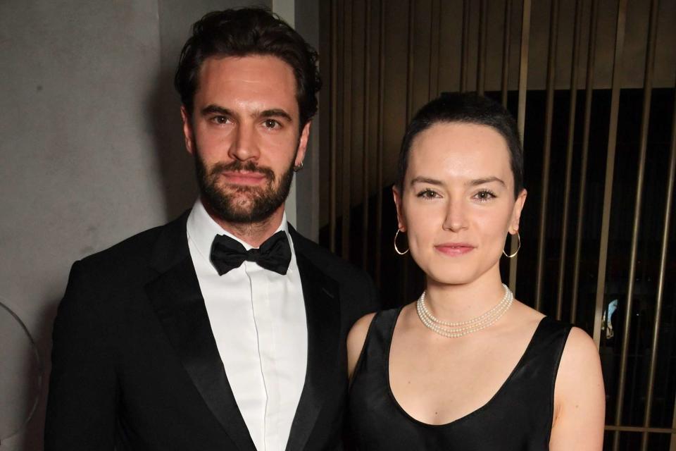 <p>David M. Benett/Dave Benett/Getty</p> Tom Bateman and Daisy Ridley attend the BFI Luminous Fundraising Gala on September 29, 2022 in London, England.