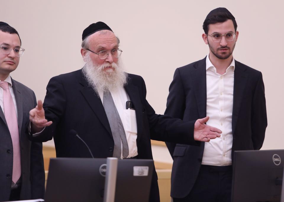 Rabbis Nathaniel Sommer and son Aaron appear in Rockland County Court to accept a plea bargain in their manslaughter case June 20, 2023. Nathaniel was questioning Judge Kevin Russo about his parole. They were charged in the death of Spring Valley firefighter Jared Lloyd and facility resident Oliver Hueston, who were killed in a fire at the Evergreen Court nursing home.