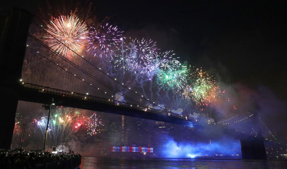 Fireworks are launched from the Brooklyn Bridge during Macy's Independence Day fireworks show on July 4, 2019 in New York City.