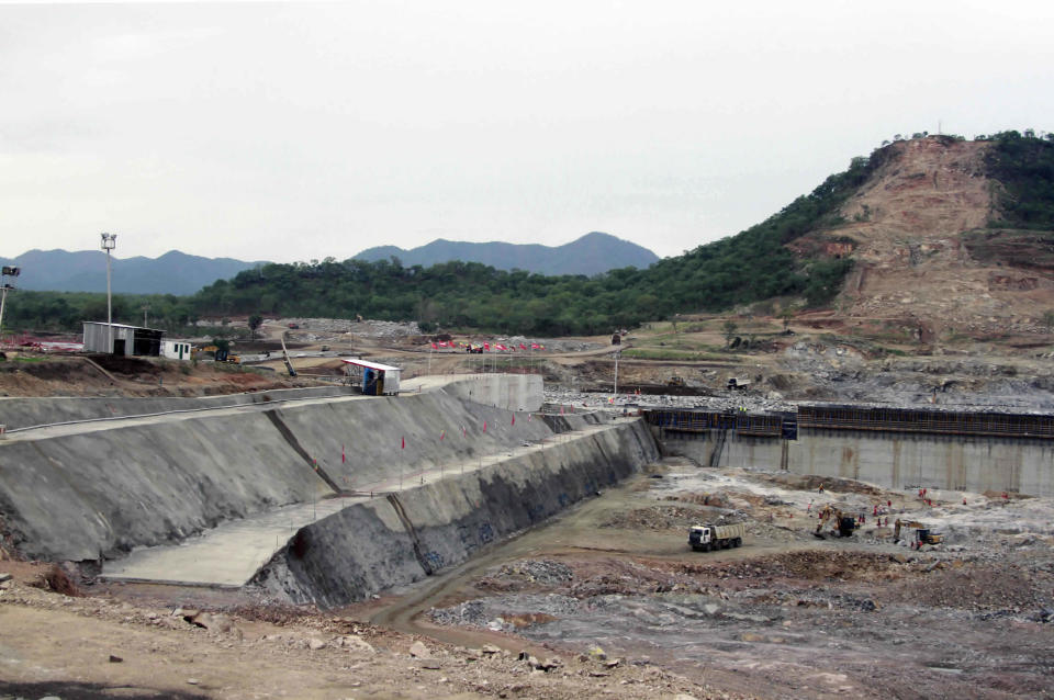 FILE - Construction work takes place, at the site of the Grand Ethiopian Renaissance Dam near Assosa, Ethiopia, on June 28, 2013. Ethiopia and Egypt say the latest round of yearslong negotiations to find an agreement over a highly contentious hydroelectric dam Ethiopia is building on the Nile river's main tributary have again ended with no agreement. Both countries blamed each other after three days of talks in Addis Ababa concluded without any deal on Tuesday, Dec. 19, 2023. (AP Photo/Elias Asmare, File)