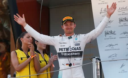 Formula One - F1 - Spanish Grand Prix 2015 - Circuit de Catalunya, Barcelona, Spain - 10/5/15 Mercedes' Nico Rosberg celebrates his win on the podium Reuters / Juan Medina