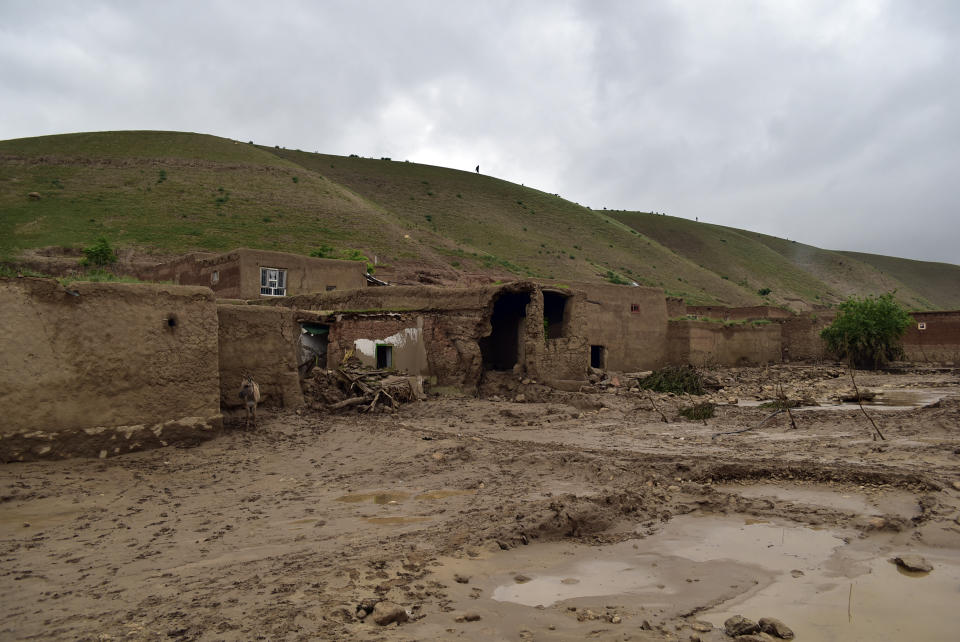 Damaged houses are seen after heavy flooding in Baghlan province in northern Afghanistan. Saturday, May 11, 2024. Flash floods from seasonal rains in Baghlan province in northern Afghanistan killed dozens of people on Friday, a Taliban official said. (AP Photo/Mehrab Ibrahimi)