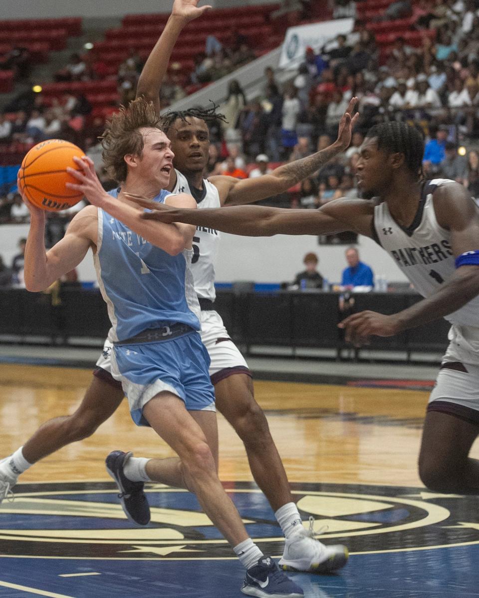 Ponte Vedra's Sam Ritchie (1) drives under the basket against Dwyer during the Class 6A boys basketball championship on March 4. The FHSAA is scheduled to vote on a proposal that would require the shot clock for the 2024 state final four.