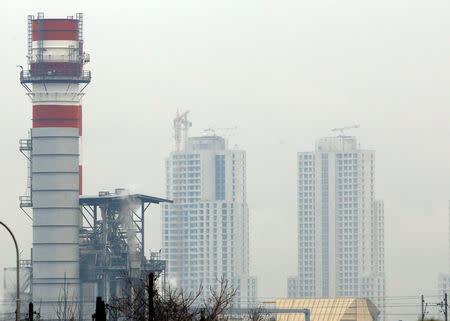 Buildings are seen near a power plant in the city of Skopje, Macedonia December 28, 2017. REUTERS/Ognen Teofilovski