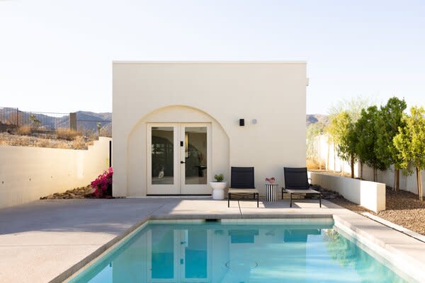 The 3,000-square foot home is nestled at the heart of Ahwatukee Foothills and is surrounded by drought-tolerant landscaping. Venea is a photographer and designed the pool house to also operate as her at home studio.