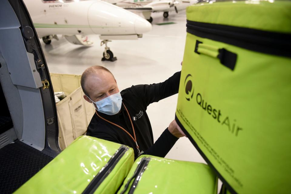 ONE-TIME USE 3/2022 Bern Township, PA - April 24: Scott Borton, national air logistics manager, loads samples into a plane at the Quest Diagnostics hangar at the Reading Airport on Friday, April 24, 2020. Most of the specimens they are transporting for testing are cornavirus / COVID-19 tests. (Photo by Lauren A. Little/MediaNews Group/Reading Eagle via Getty Images)