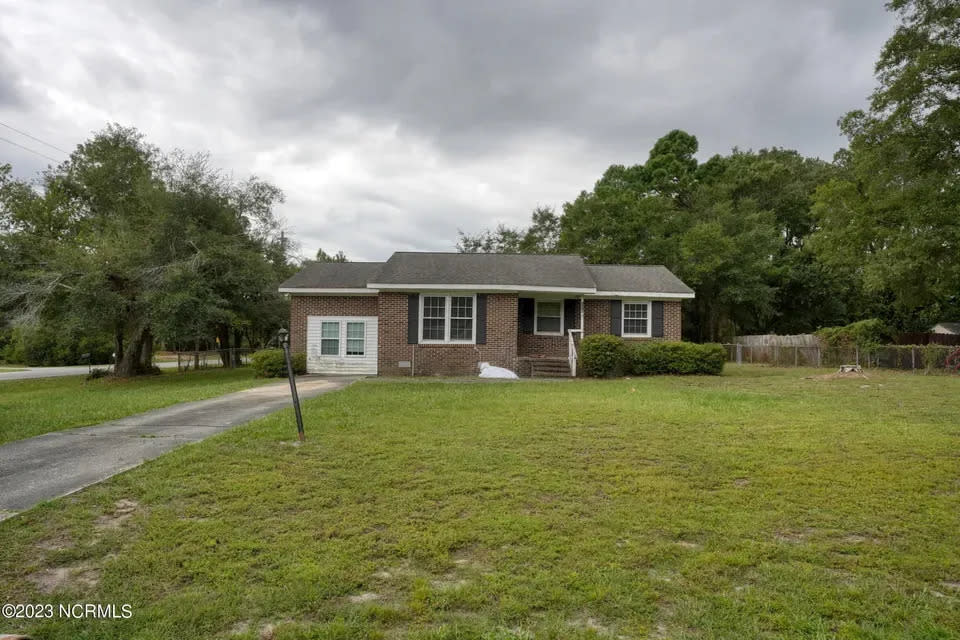 This single-family house is for sale in Wilmington, N.C., located at 118 Buff Circle.