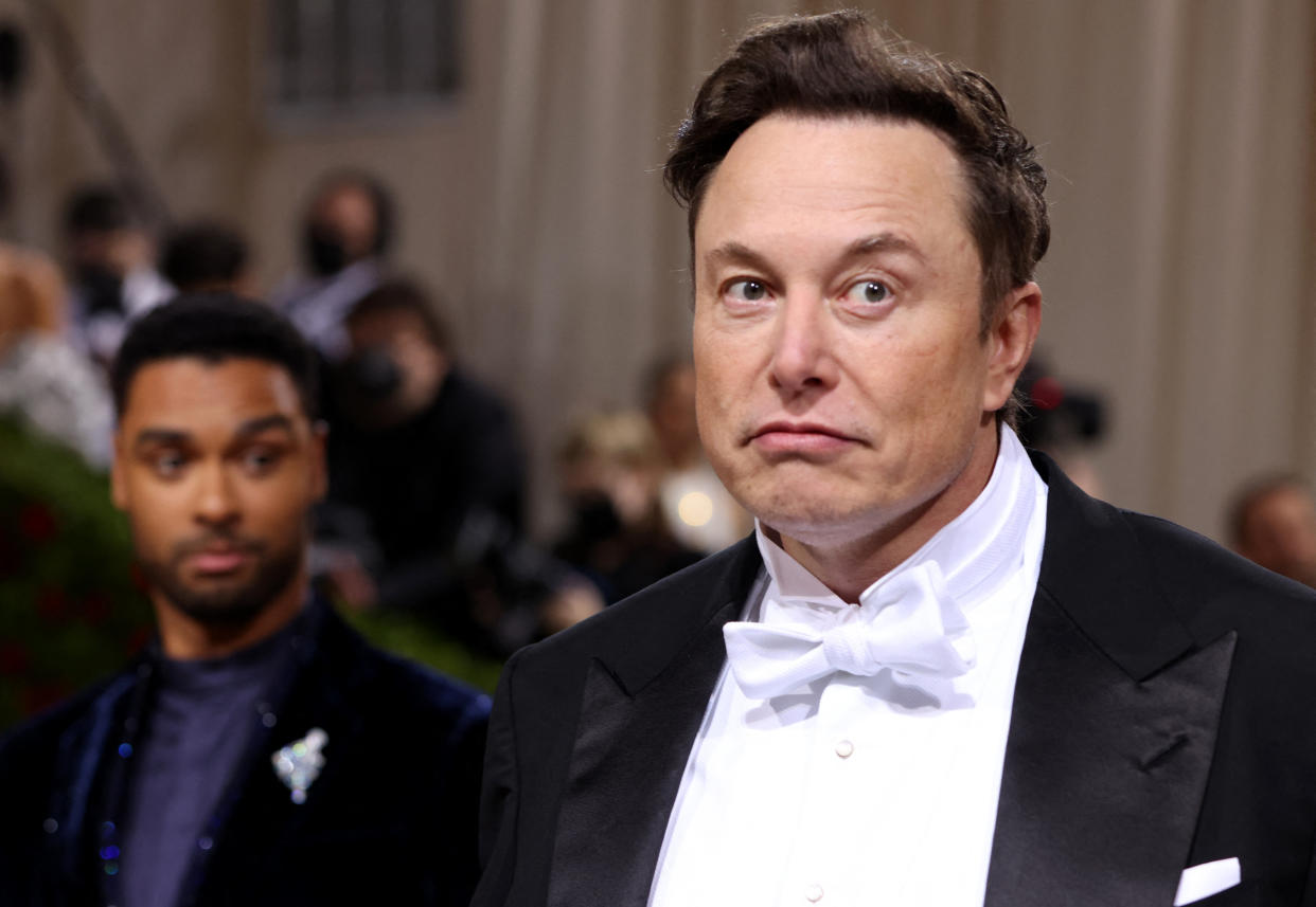 Rege-Jean Page looks at Elon Musk as they arrive at the In America: An Anthology of Fashion themed Met Gala at the Metropolitan Museum of Art in New York City, New York, U.S., May 2, 2022. REUTERS/Andrew Kelly