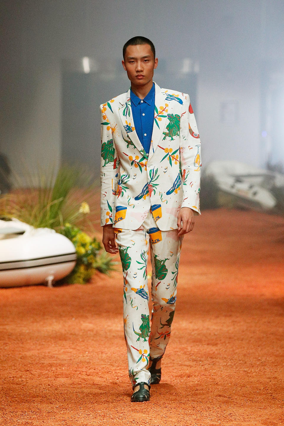 <p>Who doesn’t love a bright suit. Photo: Getty </p>