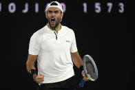 Matteo Berrettini of Italy reacts during his semifinal against Rafael Nadal of Spain at the Australian Open tennis championships in Melbourne, Australia, Friday, Jan. 28, 2022. (AP Photo/Andy Brownbill)