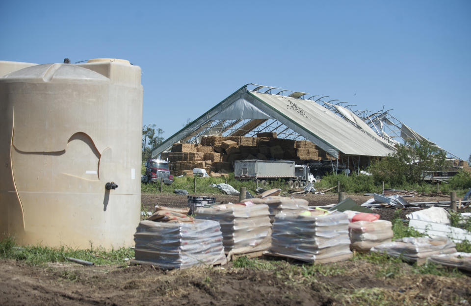 Damage to Wellacrest Farms is shown after a tornado passed through the area earlier in Mullica Hill, N.J., on Thursday, Sept. 2, 2021. The remnants of Hurricane Ida dumped historic rain over in the Northeast, with several deaths linked to flooding in the region as basement apartments suddenly filled with water and freeways and boulevards turned into rivers, submerging cars. (Joe Warner /NJ Advance Media via AP)