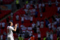 England's Harry Kane applauds fans as he celebrates his side's 1-0 win at the end of the Euro 2020 soccer championship group D match between England and Croatia, at Wembley stadium, London, Sunday, June 13, 2021. (Laurence Griffiths, Pool via AP)