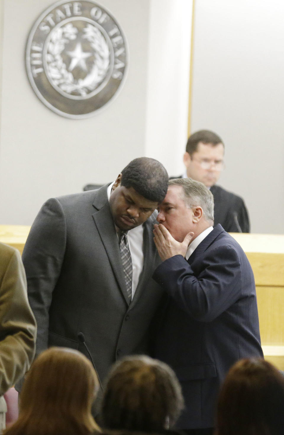 Former Dallas Cowboys' Josh Brent, left, listens to his attorney George Milner during juror selection Friday, Jan. 10, 2014, in Dallas. Jury selection continues for the upcoming trial of Brent, who's accused of killing a practice squad player in a drunken-driving wreck. Opening statements in the case are expected next week. (AP Photo/LM Otero)
