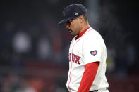 Boston Red Sox pitcher Isaiah Campbell heads to the dugout after giving up six runs in the top of the 10th inning, during a baseball game against the Baltimore Orioles, Thursday, April 11, 2024, in Boston. (AP Photo/Charles Krupa)