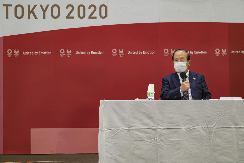 Toshio Muto, CEO of Tokyo 2020, attends a press conference after a Tokyo 2020 executive board meeting Monday, April 26, 2021 in Tokyo, Japan. (Nicolas Datiche/Pool Photo via AP)