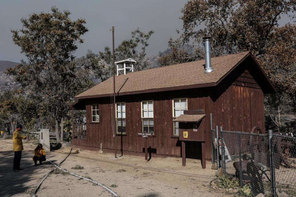 The replica of the Havilah schoolhouse, untouched by flames.