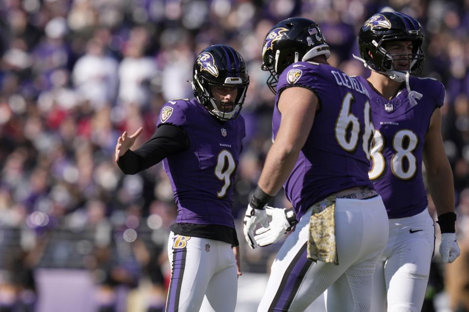 Nov 12, 2023; Baltimore, Maryland, USA; Baltimore Ravens place kicker <a class="link " href="https://sports.yahoo.com/nfl/players/26534" data-i13n="sec:content-canvas;subsec:anchor_text;elm:context_link" data-ylk="slk:Justin Tucker;sec:content-canvas;subsec:anchor_text;elm:context_link;itc:0">Justin Tucker</a> (9) celebrates his field goal against the Cleveland Browns with guard <a class="link " href="https://sports.yahoo.com/nfl/players/33482" data-i13n="sec:content-canvas;subsec:anchor_text;elm:context_link" data-ylk="slk:Ben Cleveland;sec:content-canvas;subsec:anchor_text;elm:context_link;itc:0">Ben Cleveland</a> (66) during the first half at M&T Bank Stadium. Mandatory Credit: Jessica Rapfogel-USA TODAY Sports