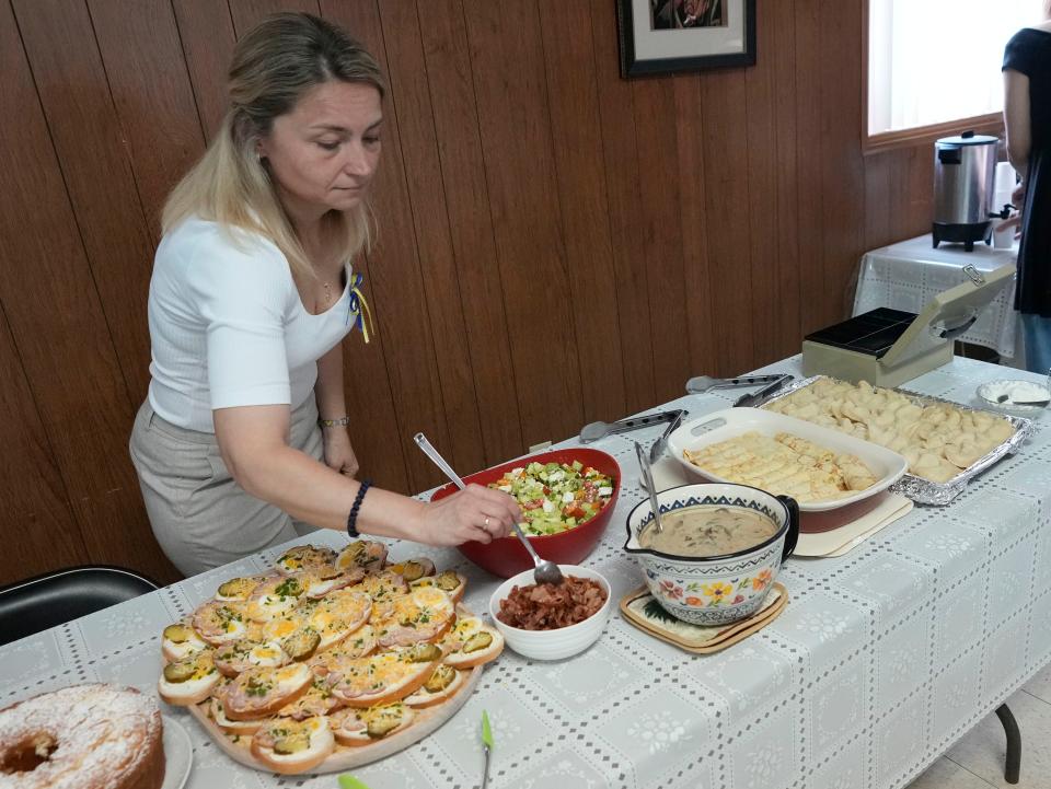 St. Michael's Ukrainian Catholic Church member Nadiya Kavyuk readies traditional Ukrainian dishes at St. Michael's Ukrainian Catholic Church on South 11th Street in Milwaukee on May 15. Nearly each week after services parishioners are treated to an assortment of traditional Ukrainian dishes.