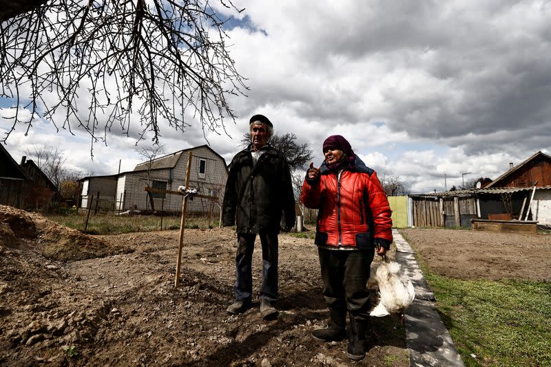 The Wider Image: Behind enemy lines, Ukrainian woman survives with her chickens