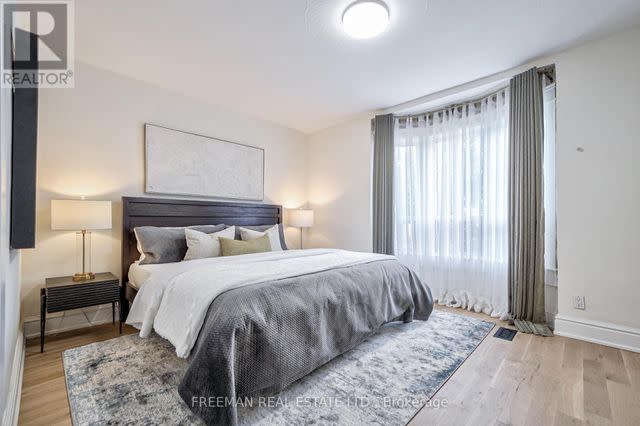 <p>unique vtour</p> A bedroom in Meghan Markle's former Toronto home